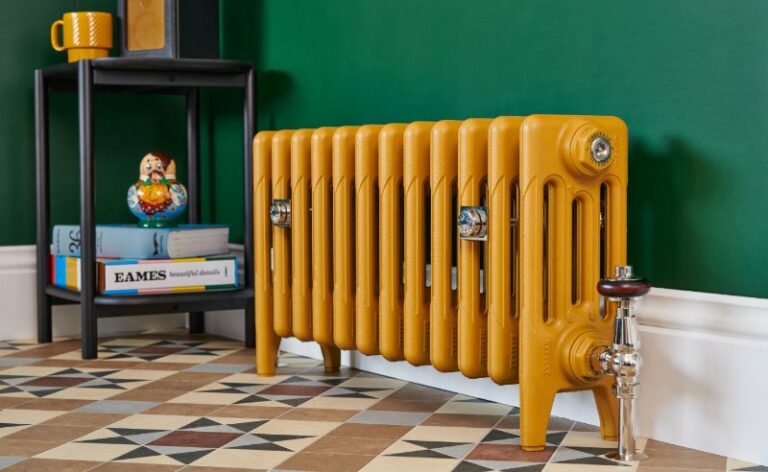 Yellow painted cast iron radiator finished in Muga by Paint and Paper Library