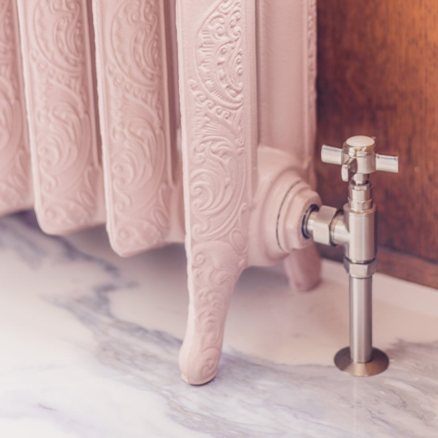 ornate cast iron radiator in little greene paint