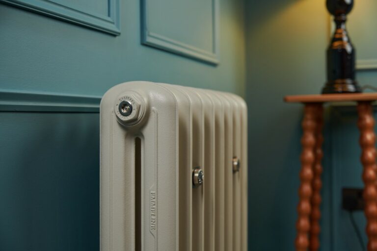 Lifestyle photo of Castrads Emmeline II cast iron radiator custom finished in Little Greene Portland Stone.