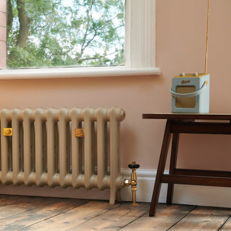 Custom made cast iron radiators ready for heat pump and finished in Paint and Paper library colours