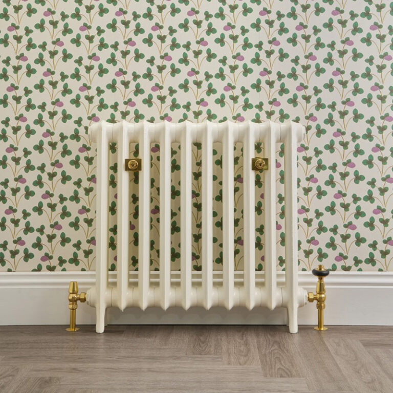 Custom made Emmeline I cast iron radiator in chalk white with brass valves.