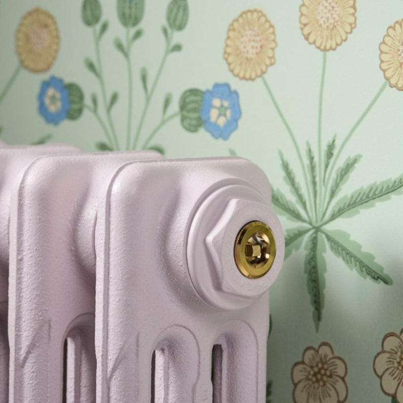 Cast iron radiator in Little Greene paint dorchester pink