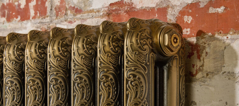 Ornate cast iron radiator in Aged gold finish