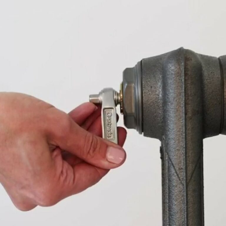 Castrads radiator key with bottle opener