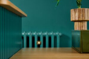Cast iron radiator in Menswear store Auteur, Manchester, UK
