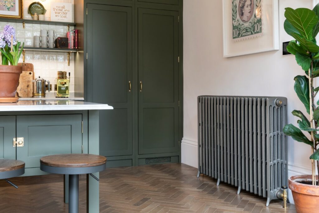 Castrads cast iron radiator in the Olive and Barr kitchen at The Country House Diaries