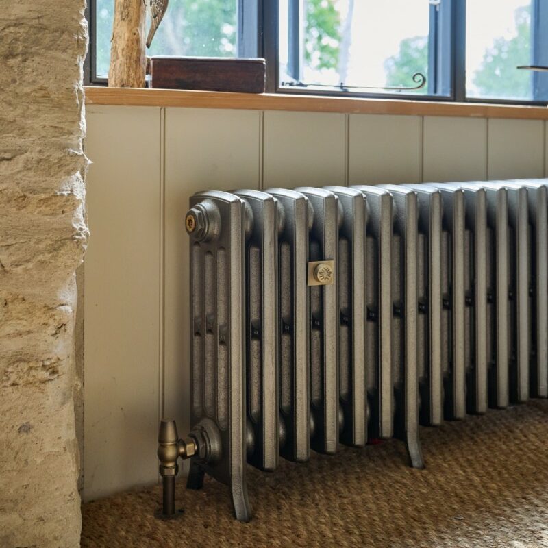 Castrads cast iron radiator in Somerset Mill conversion running a water source heat pump