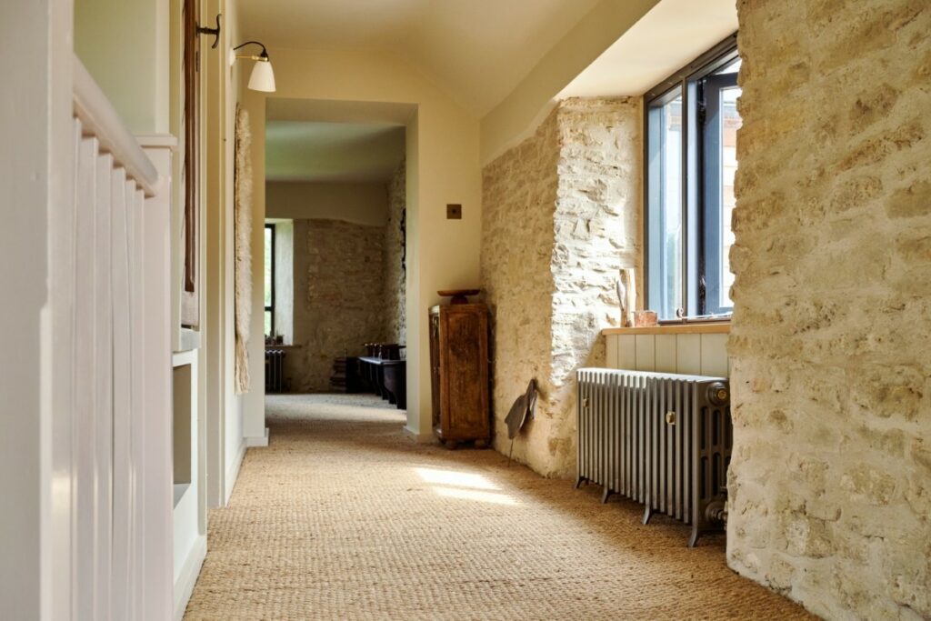 Castrads cast iron radiator in Somerset Mill conversion running a water source heat pump