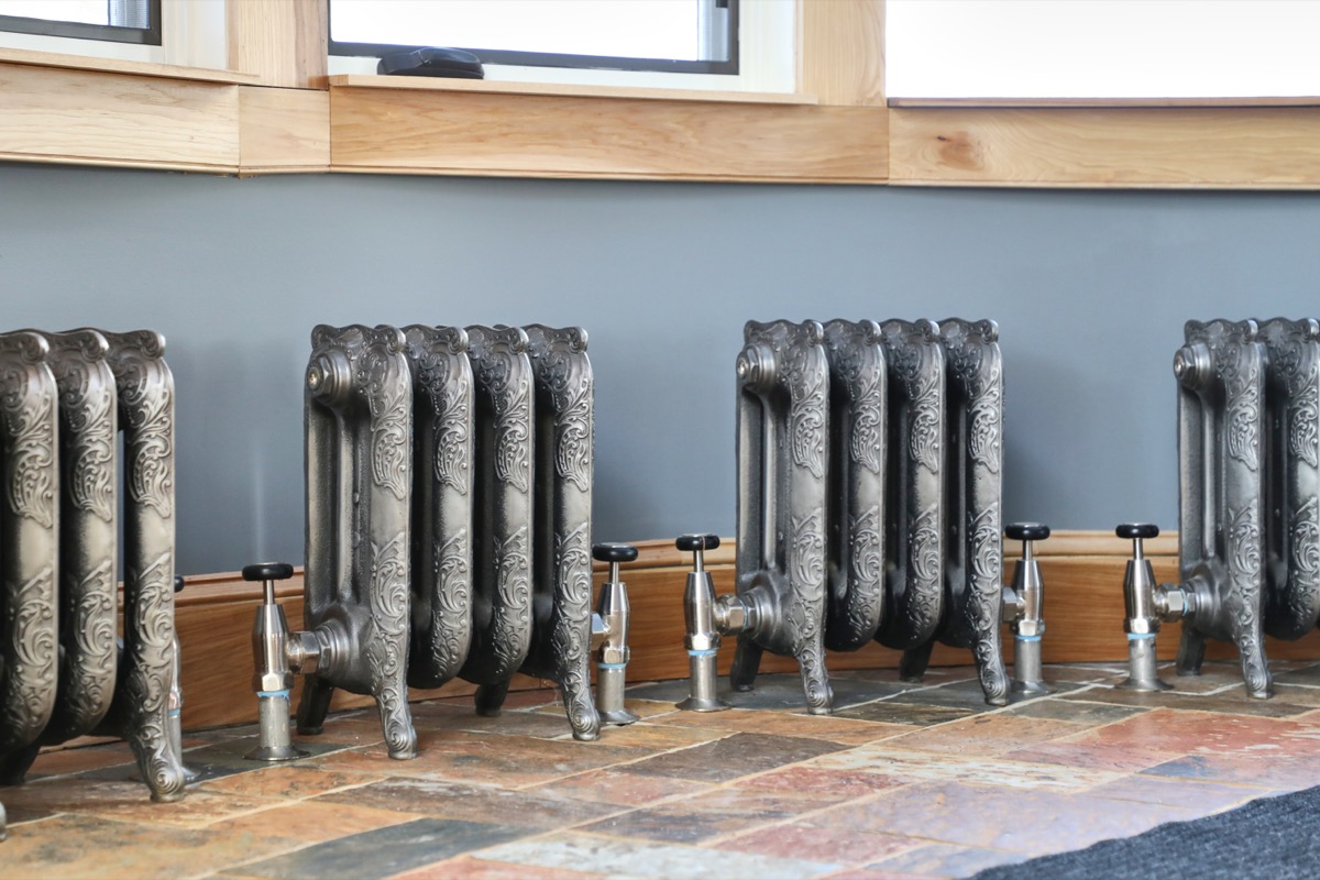 Hillside Farmhouse exterior, Shrewsbury, Vermont with Castrads cast iron radiators